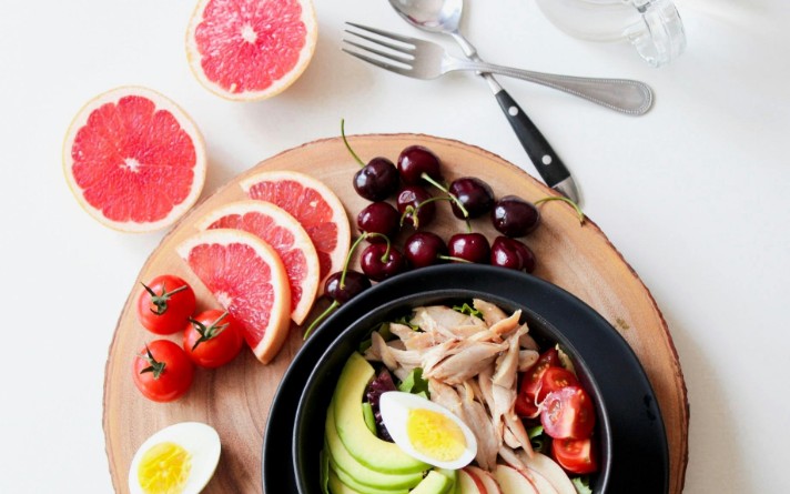 plate of healthy food with colourful grapefruit slices