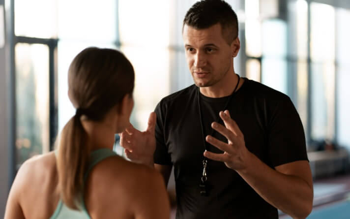 Liverpool personal trainer speaking to a client. 