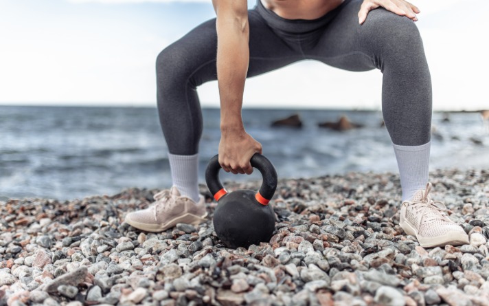 Exercise using kettlebell.