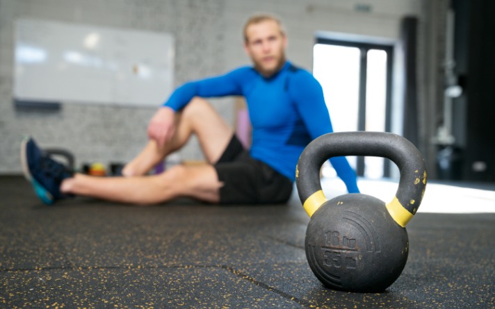 Kettlebell workout in gym