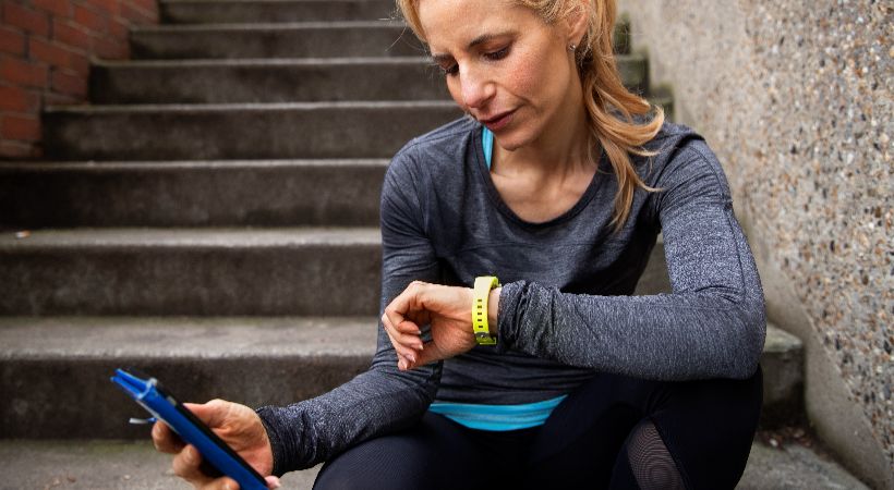 Woman tracking her progress