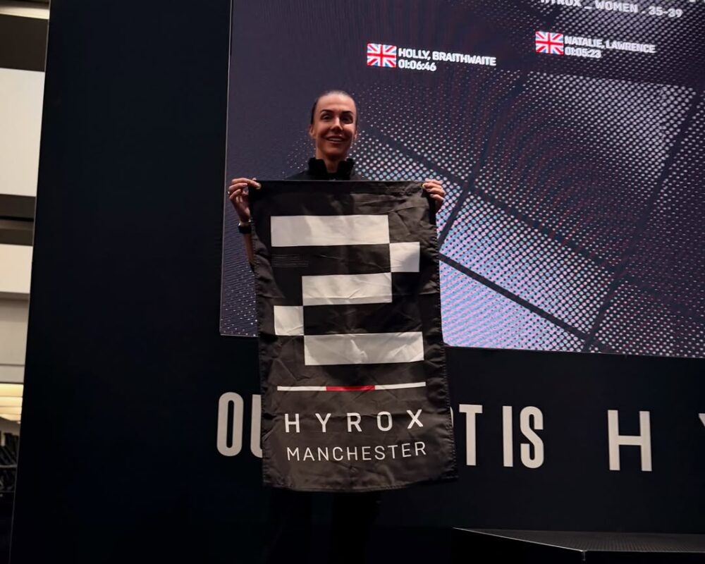 Our POW8R Co-Founder Holly at HYROX in Manchester, celebrating a 2nd place podium for her first ever HYROX.